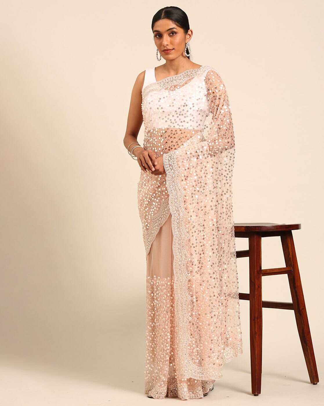 -1117Wx1400H-701183834-peach-MODEL3 Women Embellished Net Saree - Image 1